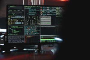 Computer screens monitoring cyber activity
