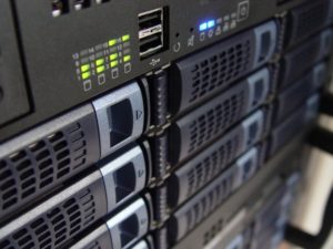 Close up photo of a stack of computer servers.