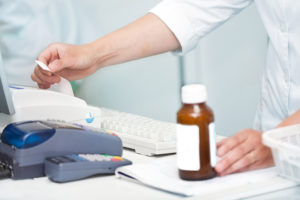 A pharmacist preparing a prescription.
