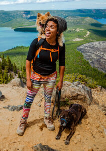 Image of a hiker with her dogs.