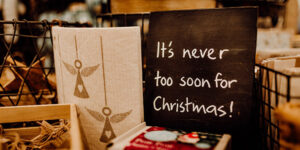 Chalkboard sign: "It's never too soon for Christmas."