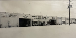 Black and white photo of Bruce Bauer Lumber storefront