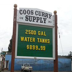 Coos Curry Supply sign