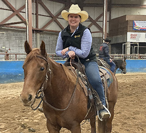 Paladin employee Alena Hoyer on her horse Rudy
