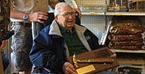 Image of Gene Kelley and his Golden Hammer Award.