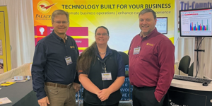 Paladin Customer Experience Specialist Alena Hoyer with Paul Butcher and Ryan Dunn at the House-Hasson dealer market.