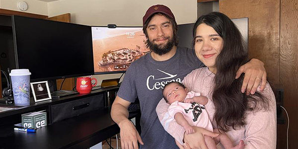Newsletters_April25_EthanNFam-600 Paladin Software Engineer Ethan Hernandez-Haga with his wife Briana and daughter Aurora