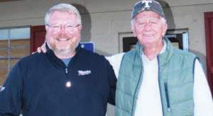 Carl Houser Sr. and his son, Carl Houser Jr. in front of Blountville Hardware