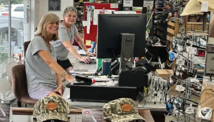 Laura Ward and Erika Brown at the checkout counter of Sawgrass Hardware