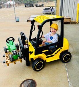 South Beau Hardware kid in toy forklift