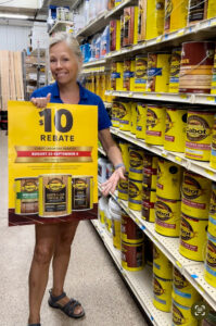 Yvette Peterson shows off Mazo Hardware's paint and stains.