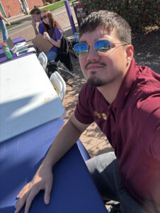 JJ getting some sun and recruits at a Grand Canyon University job fair.