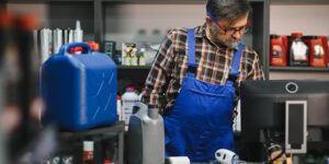 A hardware store employee working on a mobile computer
