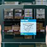 Hands holding a tablet displaying hardware store products images.