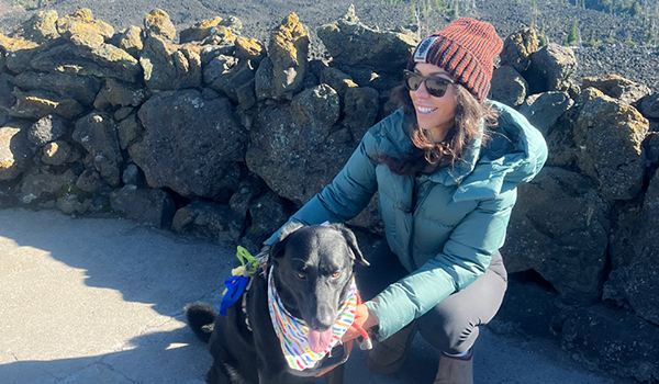Paladin Communications Specialist Kristine Luque and her dog 