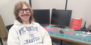 Paladin Technical Support Representative/PaladinGo Project Manager Ben Chartraw in his cubicle at work.
