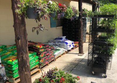 Gardening supplies displayed outside Casto Trading Company